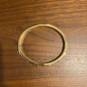 Michael Kors gold bracelet.